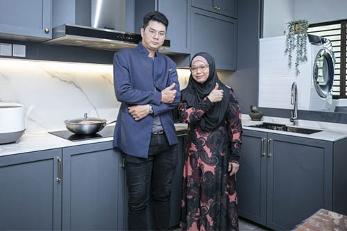 Homeowners celebrating in their finished home