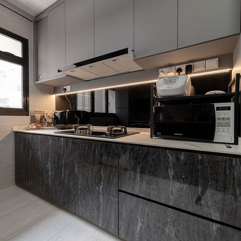 Open living and dining area with media wall at Fernvale Road