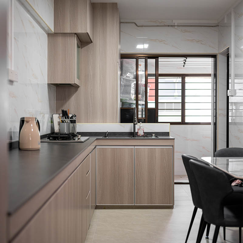 Warm minimalist interior with concealed storage at Yishun Street